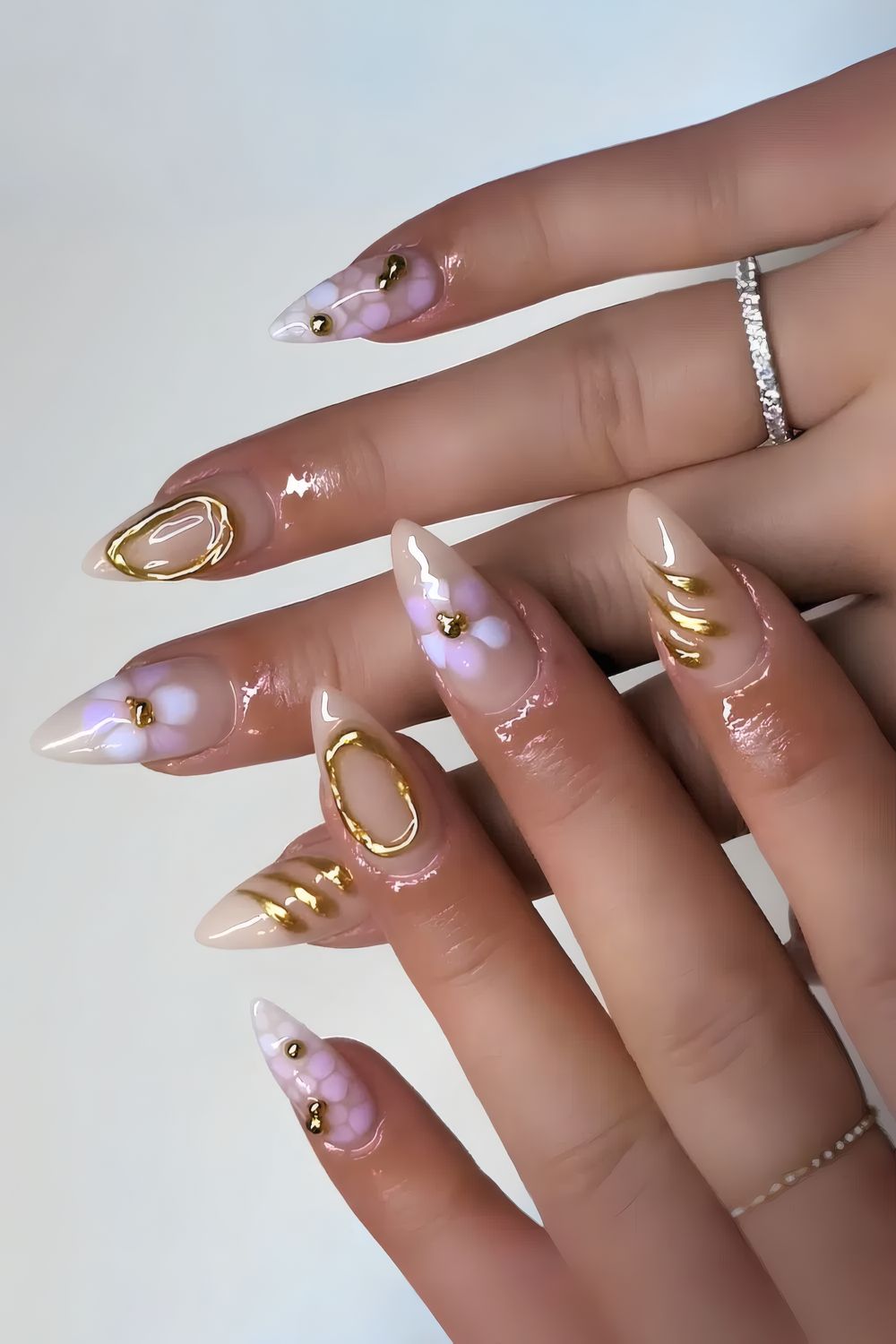 Milky Nails with Purple Blooms and Gold Chrome Accents