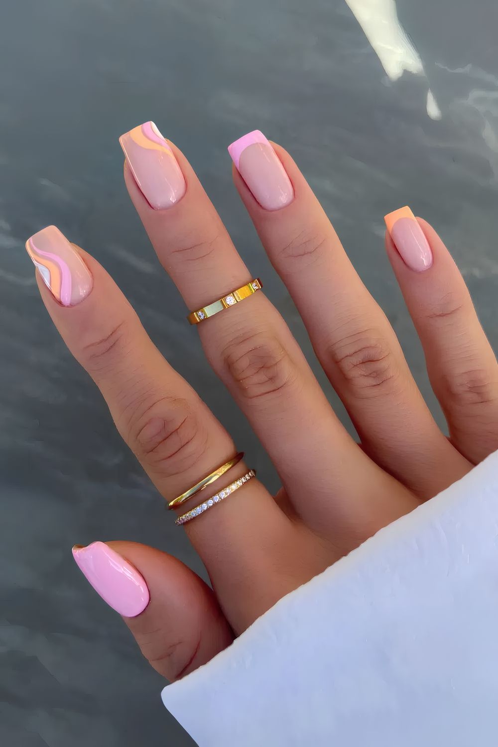 Pink and Orange Nails with Swirl Details